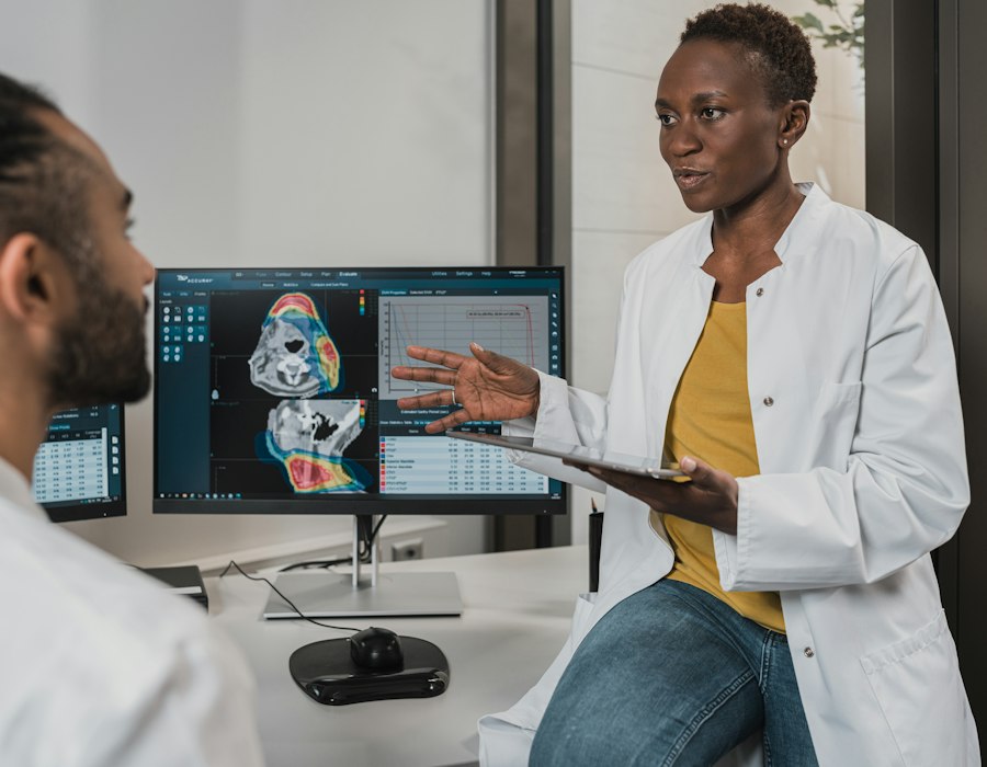 Clinician explaining a scan to a colleague